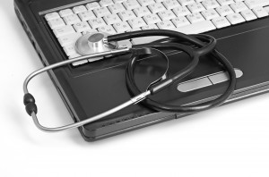 Stethoscope on laptop