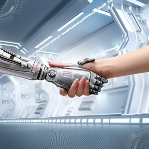 Photograph of a human hand shaking a robot hand in solidarity.