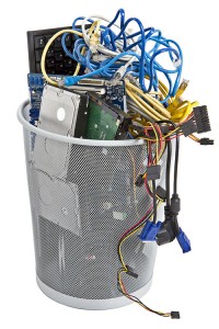 Photo of trash can full of e-waste.